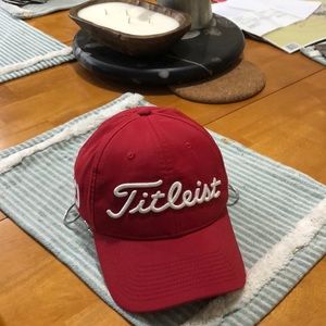 Gently used red Titleist / Footjoy Hat.